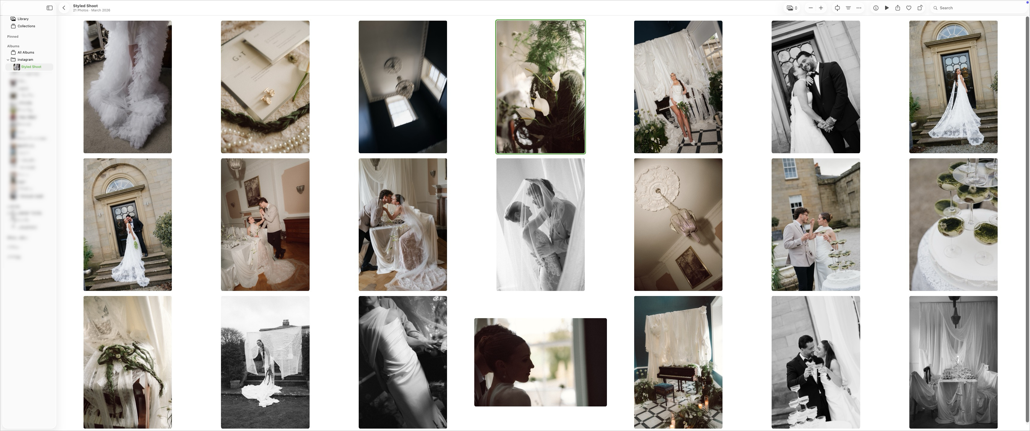 Photos appearing in Apple Photos organised into albums